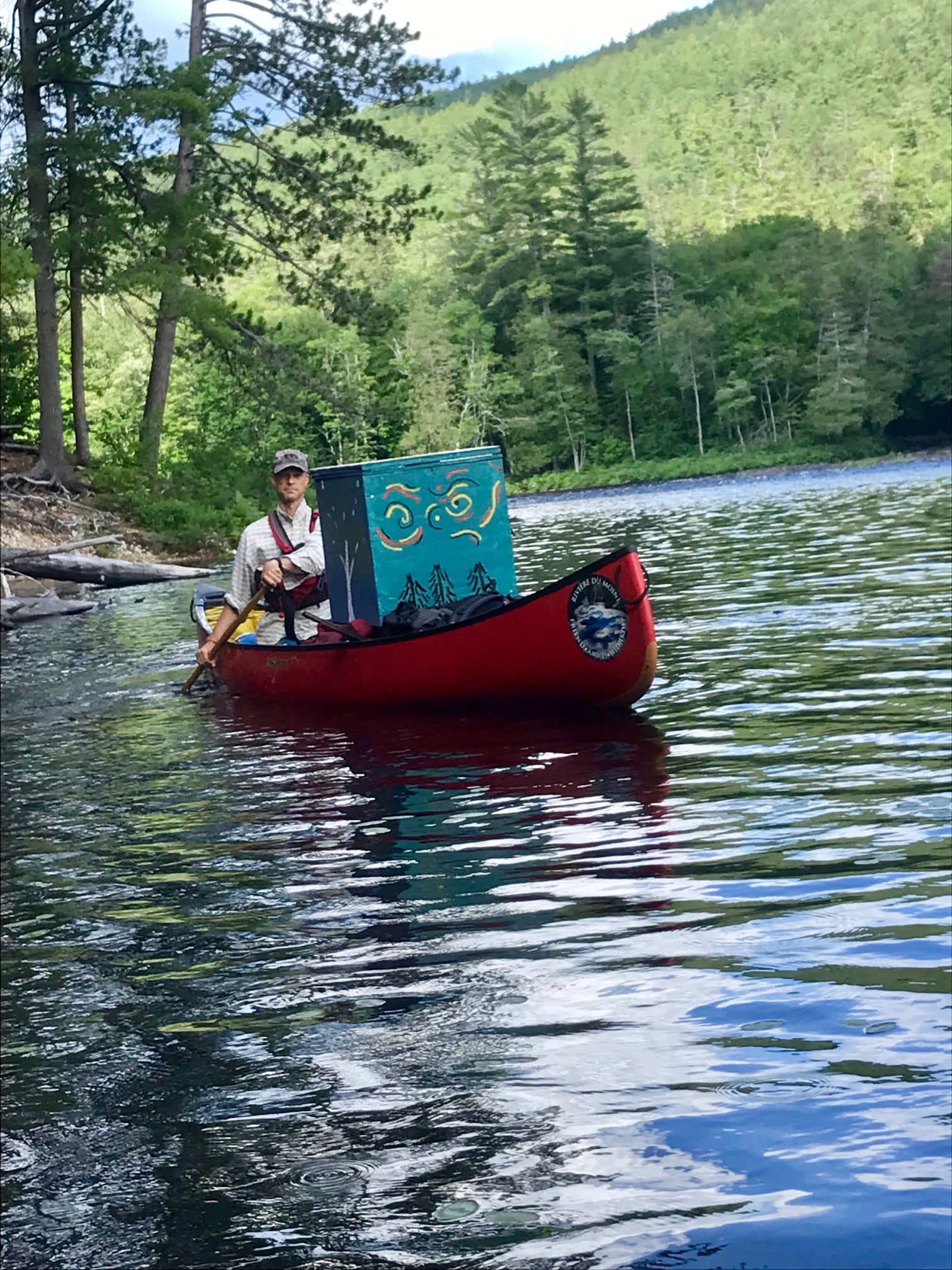 thunderbox being canoed to campsites